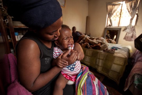 mother struggles with baby